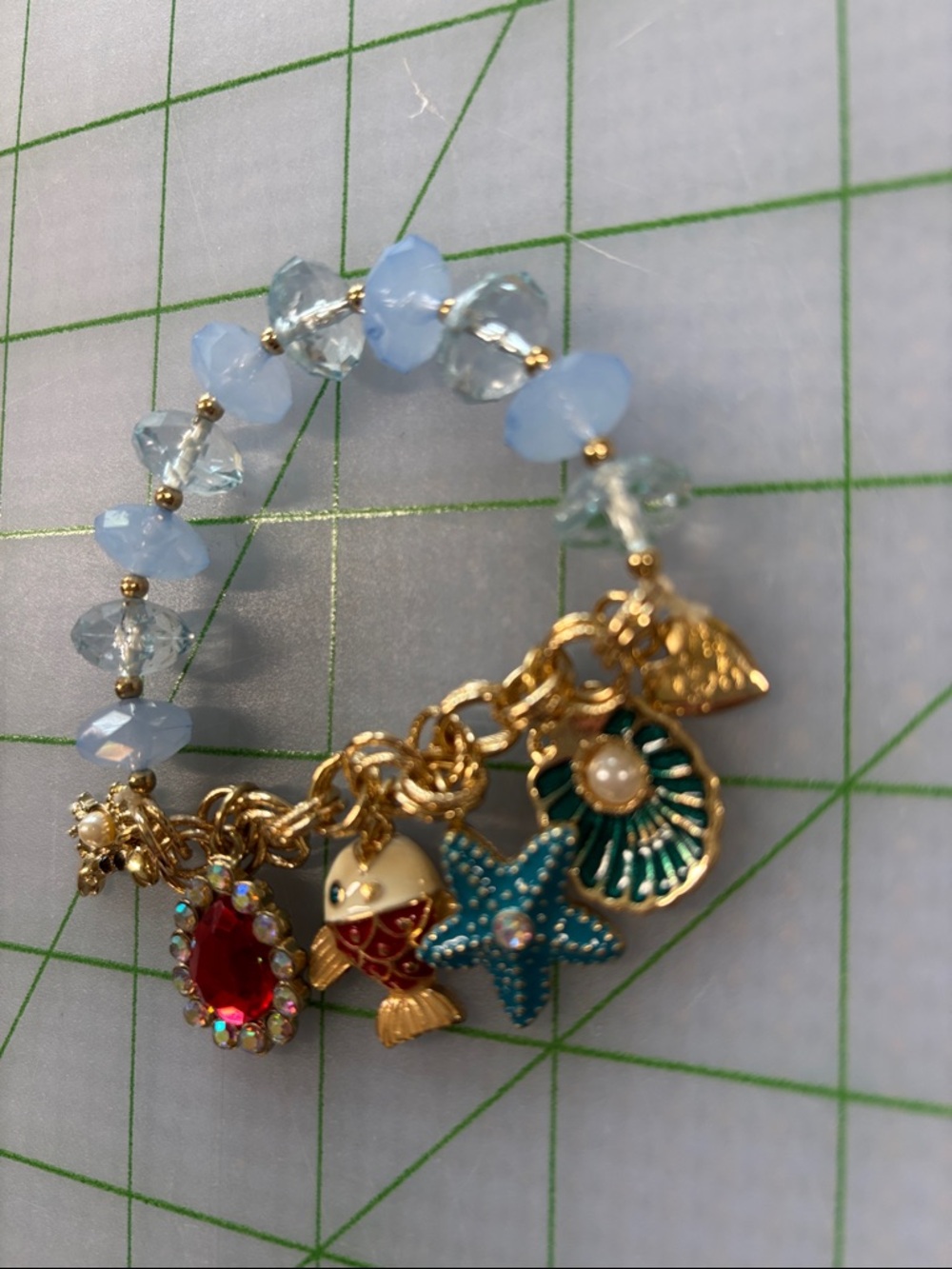 Gold Charm Bracelet with Light Blue Beads and Ocean Charms - Picture 2 of 3
